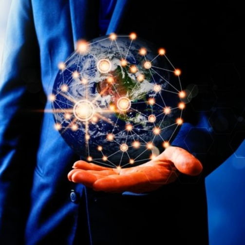 Person holding globe with stars representing language translation agency in Los Angeles