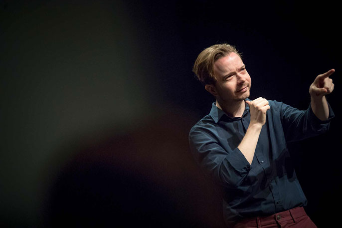 performer Wink man signs ASL